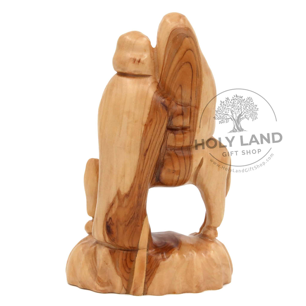 
                  
                    Load image into Gallery viewer, Flight into Egypt Hand Made Bethlehem Olive Wood Statue Back View
                  
                