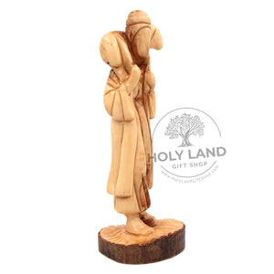 
                  
                    Load image into Gallery viewer, Good Shepherd Abstract Carved in Bethlehem Olive Wood Right Side View
                  
                