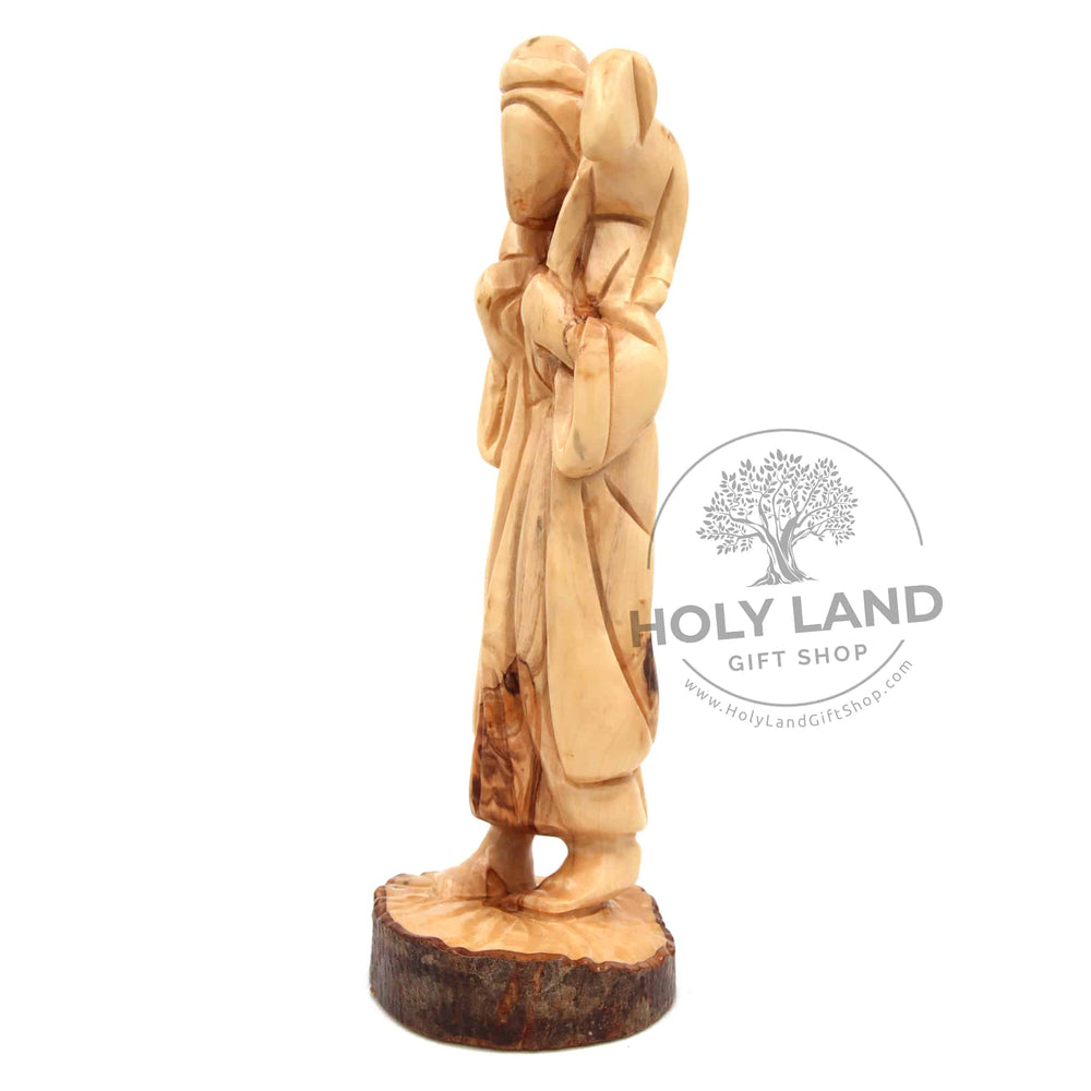 
                  
                    Load image into Gallery viewer, Good Shepherd Abstract Carved in Bethlehem Olive Wood Left Side View
                  
                