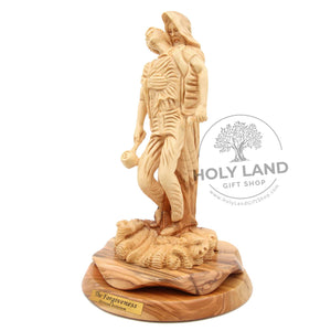 
                  
                    Load image into Gallery viewer, Hand Carved Olive Wood Forgiveness Statue Side View
                  
                