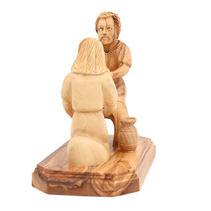 
                  
                    Load image into Gallery viewer, Jesus washing feet Holy Land olive wood statue side view
                  
                