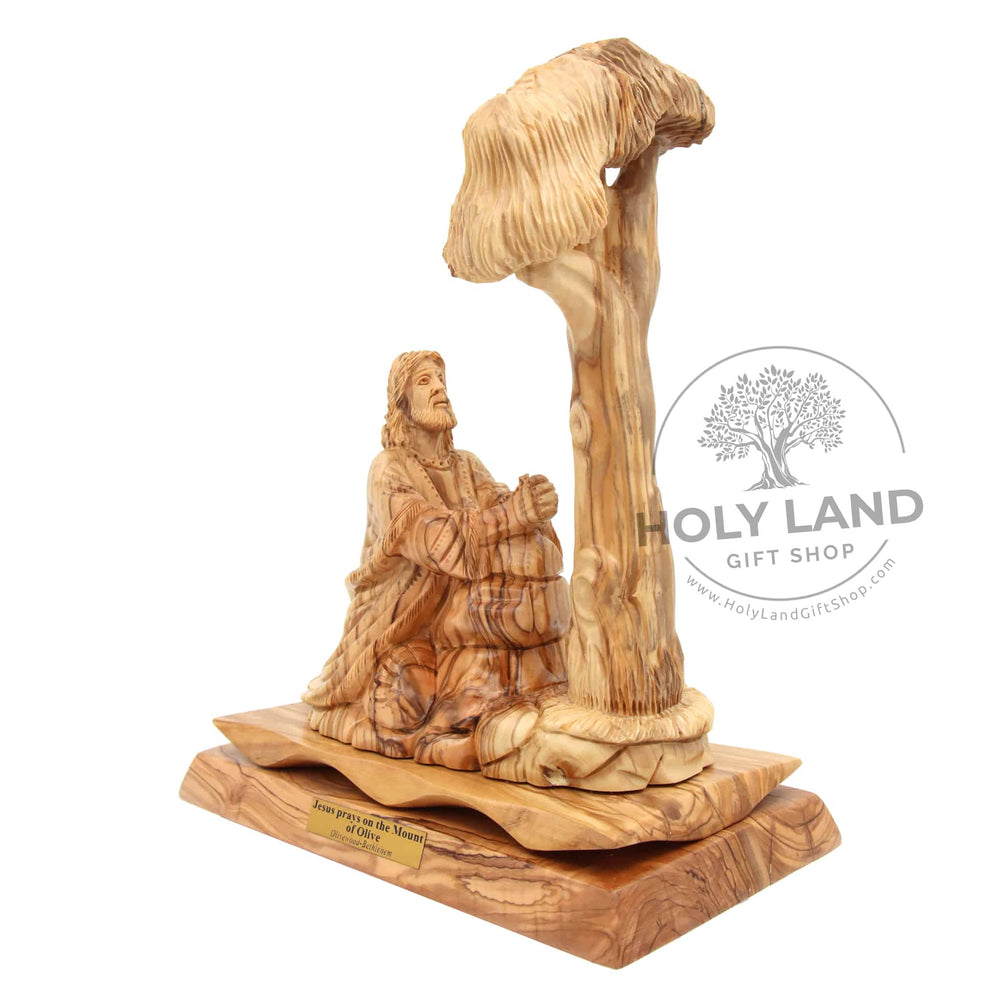 
                  
                    Load image into Gallery viewer, Jesus prays at the Mount of Olives Hand Carved Olive Wood Statue Side Front View
                  
                