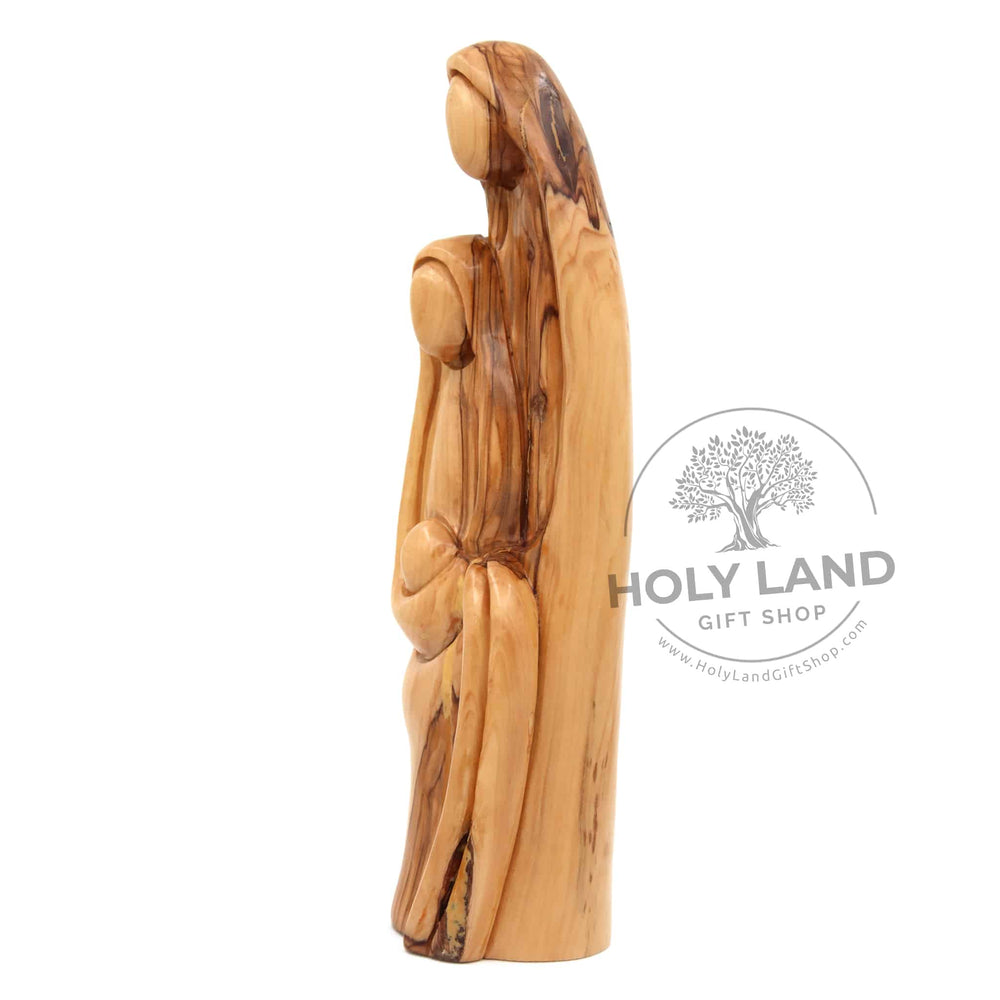 
                  
                    Load image into Gallery viewer, Abstract Bethlehem Olive Wood Holy Family Statue left Side View
                  
                