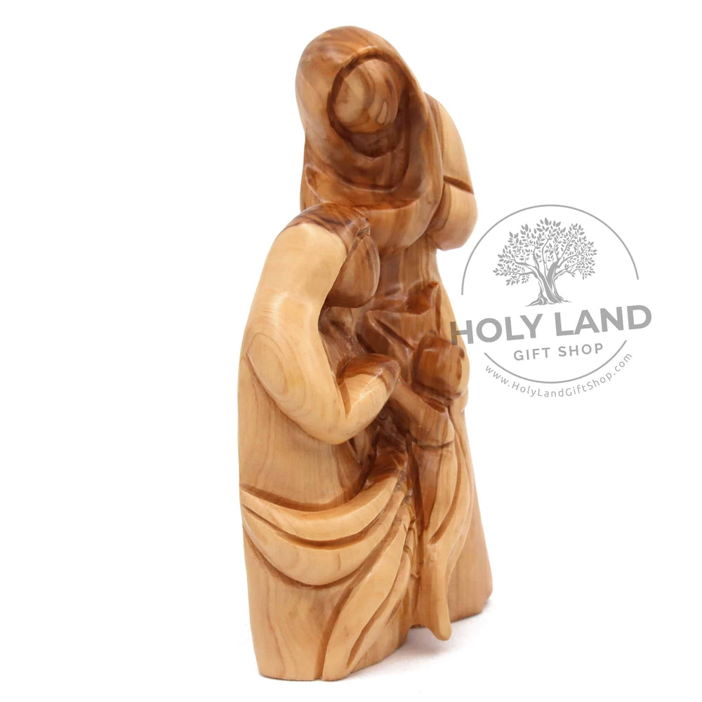 
                  
                    Load image into Gallery viewer, Olive wood Holy Family Statue Starring Jesus Right Side View
                  
                