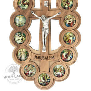 
                  
                    Load image into Gallery viewer, Oval Olive Wood Crucifix Plaque with 14 Stations of the Cross Close-up View
                  
                