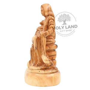 
                  
                    Load image into Gallery viewer, Pieta of Carved Bethlehem Olive Wood Statue from the Holy Land Side View
                  
                