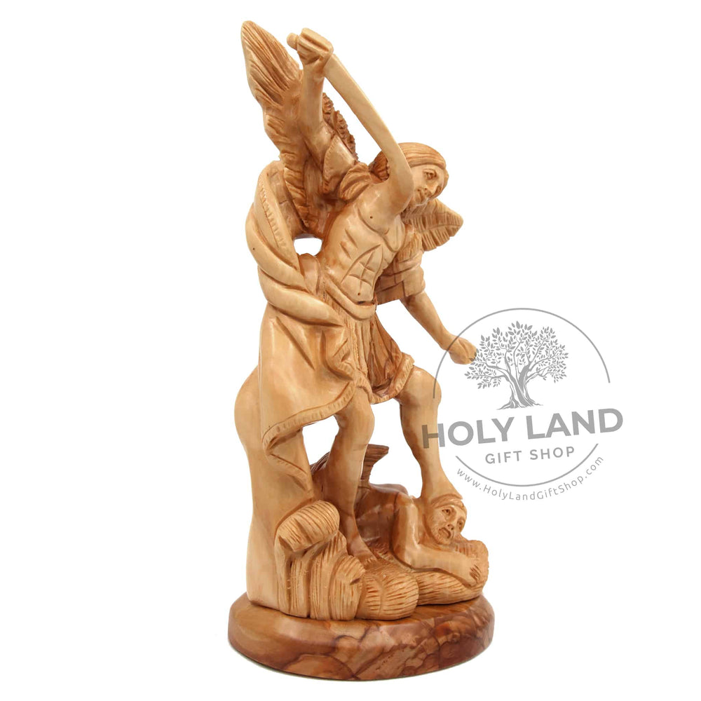 
                  
                    Load image into Gallery viewer, Saint Michael Bethlehem Hand Carved Olive Wood Statue Crushing Satan Side View
                  
                