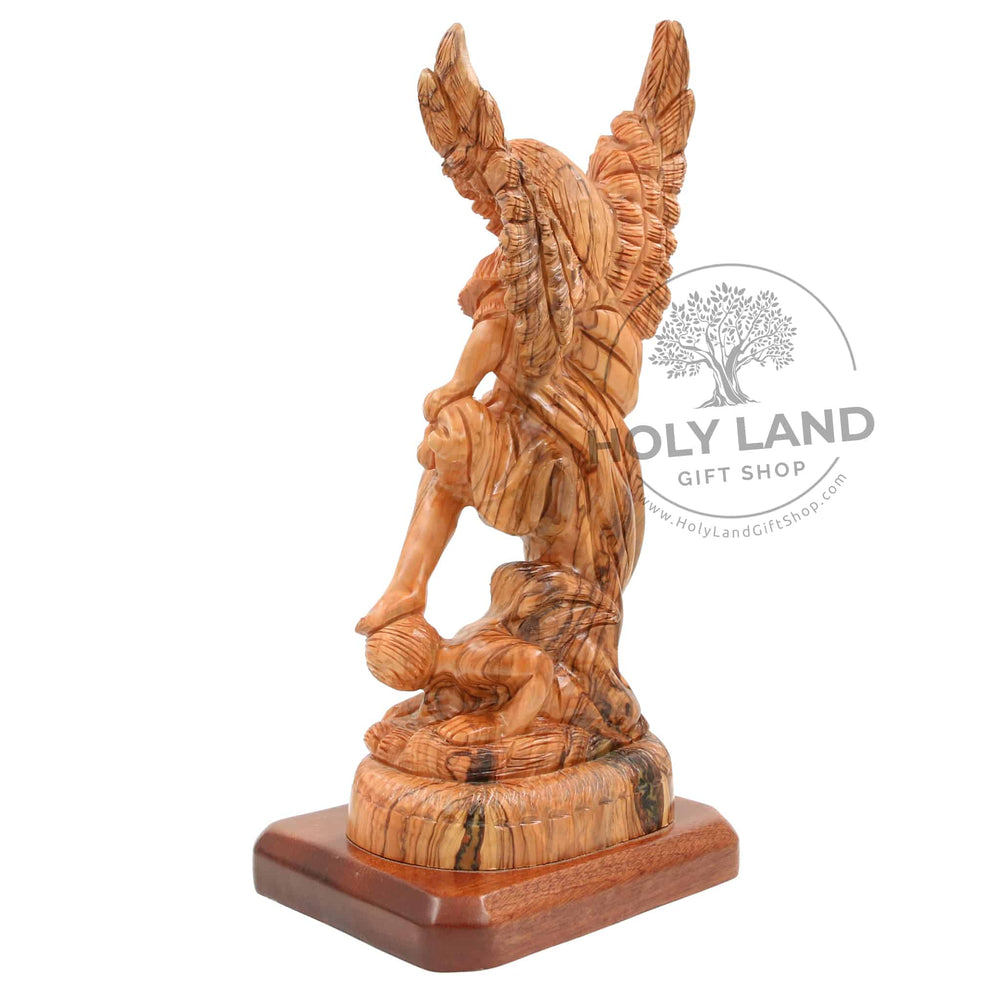 
                  
                    Load image into Gallery viewer, St. Michael Defeats Satan Carved in Bethlehem Olive Wood from the Holy Land Back View
                  
                