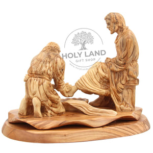 
                  
                    Load image into Gallery viewer, The Master Becomes a Servant Handicraft Bethlehem Olive Wood Statue Back View
                  
                